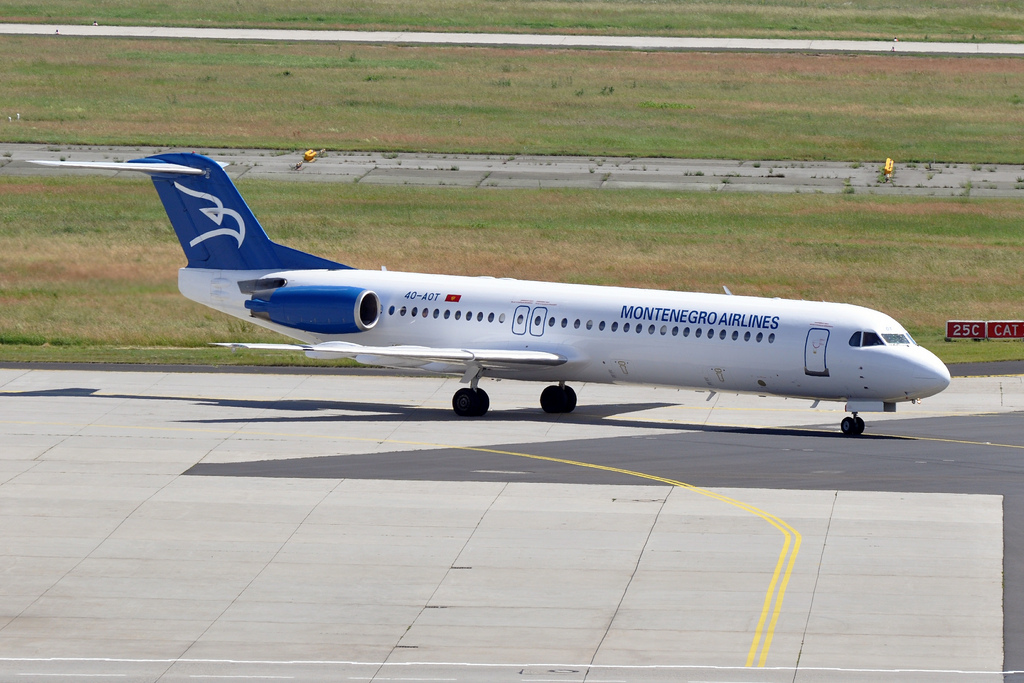 Photo of Montenegro Airlines 4O-AOT, Fokker 100