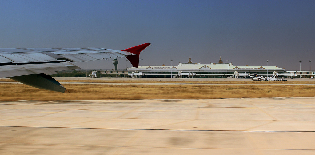 Image of THAI AIR ASIA FLIGHT FD2761 TAXYING FOR TAKE OFF AT MANDALAY INTERNATIONAL AIRPORT HS-ABD AIRBUS A320 MYANMAR FEB 2013